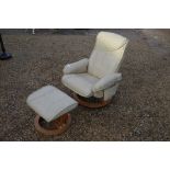 A cream leatherette Stressless style reclining armchair and stool (2)