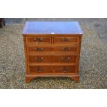 A reproduction yew wood crossbanded filing chest