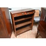 An Edwardian mahogany inlaid open bookcase