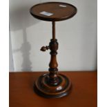 A Victorian mahogany candle stand