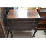 A reproduction mahogany chest of drawers