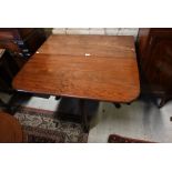 A George III Cuban mahogany gate-leg supper table