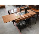 Oak and iron treadle Singer sewing machine table