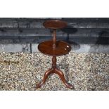 A Victorian mahogany two-tier occasional table