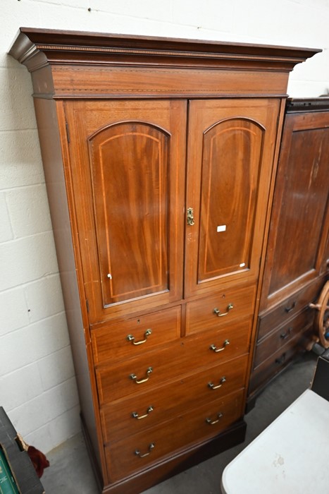 An Edwardian mahogany wardrobe