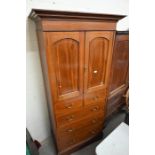 An Edwardian mahogany wardrobe