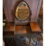 A large mahogany dressing table