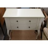 A cream finish two drawer chest