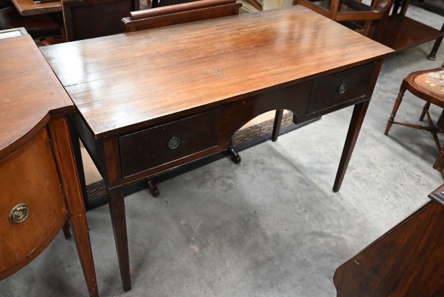 A late Victorian mahogany writing table