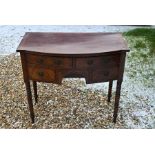 A 19th century mahogany inlaid bowfront dressing table