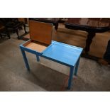 A vintage blue painted beech double compartment school desk