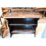 A dark oak open bookcase