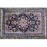 A Persian Kerman rug