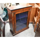 A Victorian walnut and satin inlaid pier cabinet