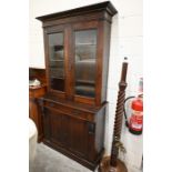 An Edwardian chiffonier bookcase