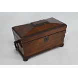 A Regency mahogany sarcophagus shaped twin compartment tea caddy