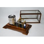 A vintage mahogany cased brass pillared barograph