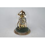 Twaites & Reed, no 25/10005, a diminutive brass skeleton clock