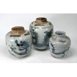 Two South East Asian provincial blue and white jars and similar wine jar (3)