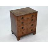 An early 19th century mahogany four drawer chest