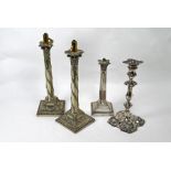 Two silver candlesticks and pair of EP candlesticks