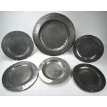 Six antique pewter plates