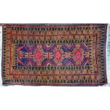 A Belouch rug, brown/red,