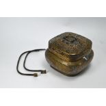 A late 19th or early 20th century Chinese brass portable hand warmer