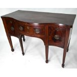 A George III mahogany serpentine form sideboard