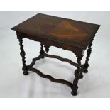 An antique Continental quarter-veneered centre table