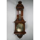 A late 19th century mahogany cased barometer