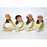 Four Royal Doulton Dickens-character napkin rings