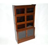 A four tier Lebus brand sectional mahogany bookcase