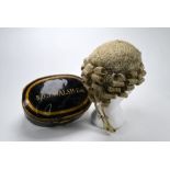 A vintage horse-hair barrister's peruke (wig), in Ravenscroft of Lincoln's Inn japanned tin