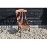 An elm seated slat back kitchen elbow chair