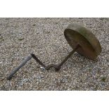 An old cut stone and iron knife sharpener