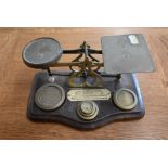 A Victorian set of mahogany and brass letter scales with weights