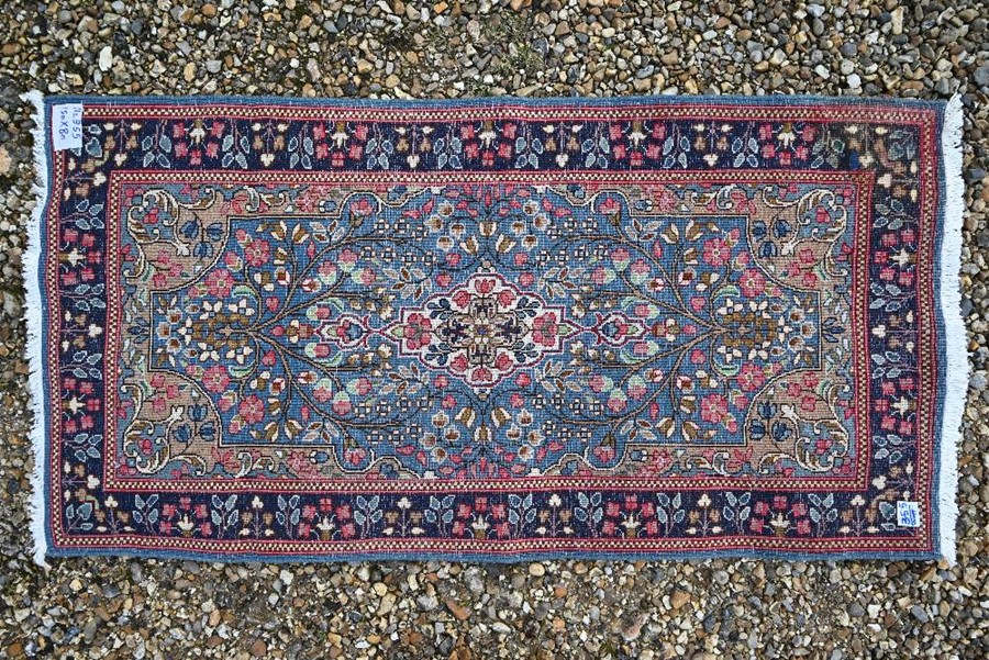 A Persian blue ground Kerman rug, 150 cm x 80 cm - Image 2 of 2
