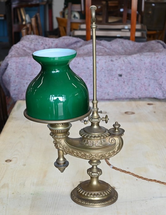 An ornate brass table lamp