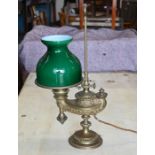 An ornate brass table lamp