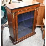 A Victorian walnut and satin inlaid pier cabinet