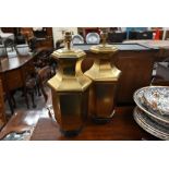 A pair of large gilt metal hexagonal baluster table lamps and shades