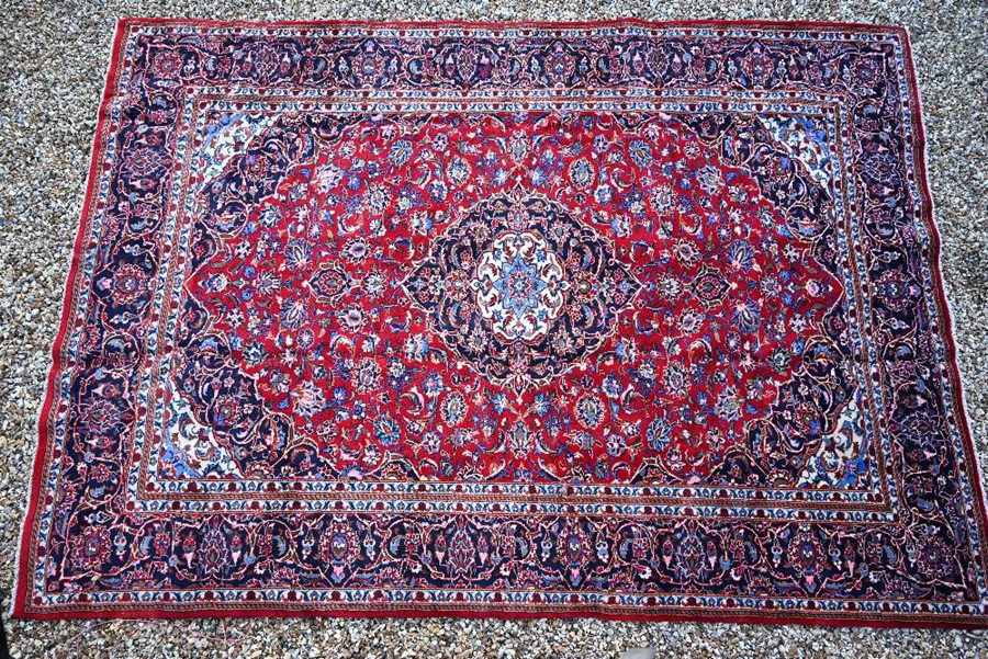 A large Persian Kashan carpet
