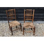 A set of four elm spindle back rush seated dining chairs