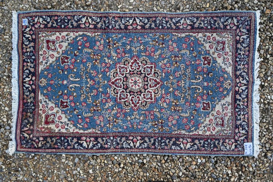 A Persian Kerman rug - Image 2 of 2