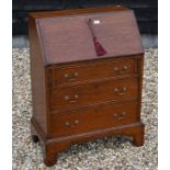 A small oak fall front bureau