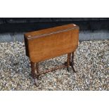 An Edwardian mahogany Sutherland table