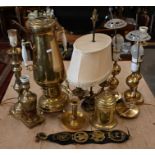 A large pair of Victorian brass baluster candlesticks