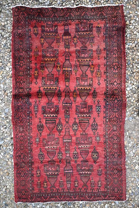 A Persian Kerman rug, 150 cm x 90 cm