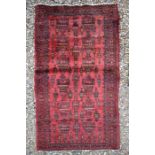 A Persian Kerman rug, 150 cm x 90 cm
